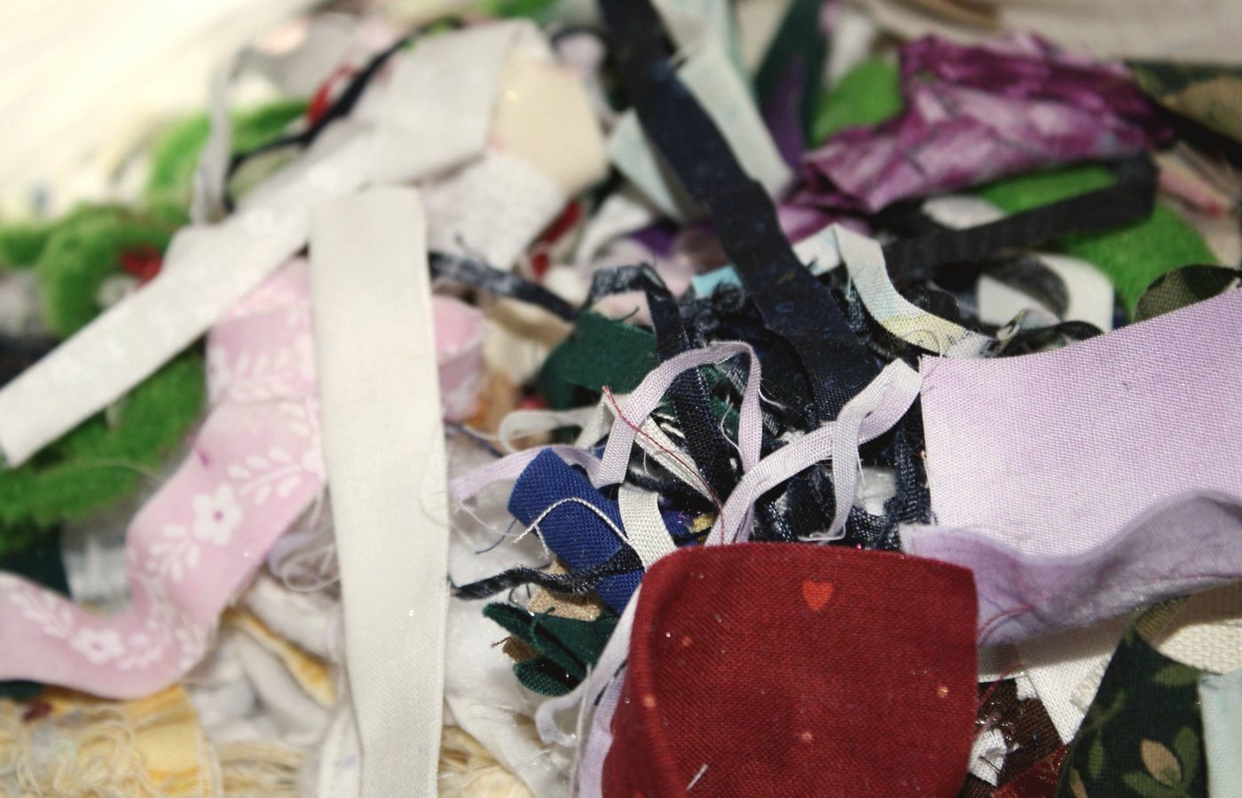 Pieced fabric scraps waiting to be sewn into a new piece