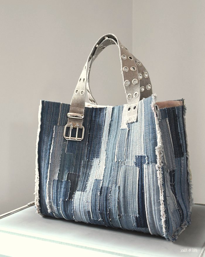 A handmade tote bag sewn from repurposed fabric